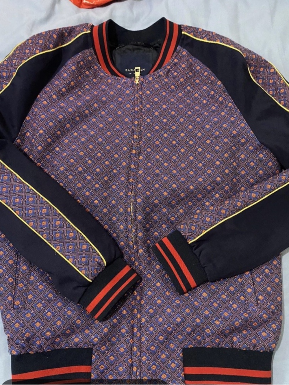 Zara Man geometric pattern bomber jacket.